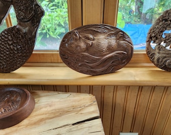 Otter carved in black walnut