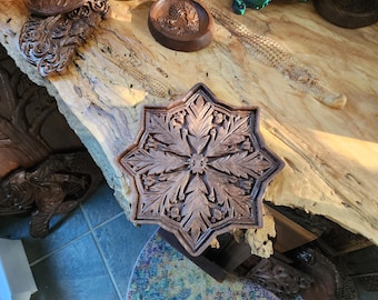 Snowflake carved in black walnut