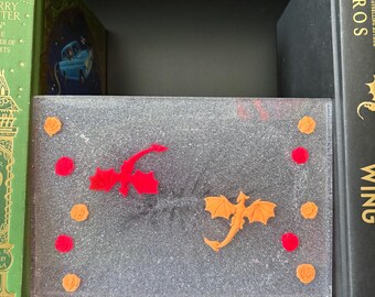 Neon pink and orange dragons