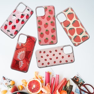 May include: Set of six phone cases with a strawberry pattern. The cases are pink, white, and red with a variety of strawberry designs.
