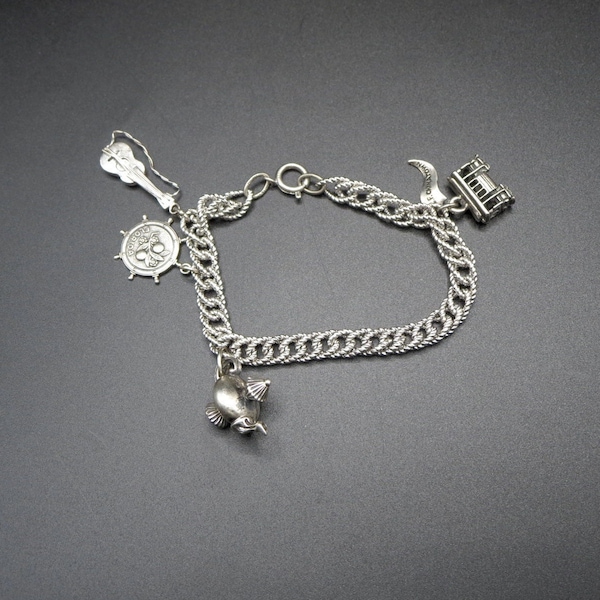 Vintage Beaucraft Sterling Silver Charm Bracelet With 4 Charms 25 gms.