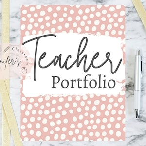 May include: A pink and white polka dot Teacher Portfolio with the words "Teacher Portfolio" in a handwritten font. A silver pen and gold ribbons are on a marble background.