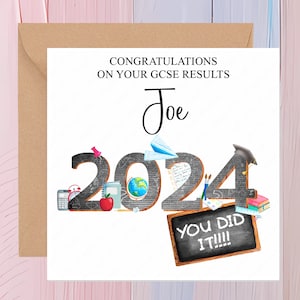 May include: A white card with a brown envelope. The card has a black and white illustration of the year 2024 with school supplies and the text "Congratulations on your GCSE results Joe You Did It!!!".
