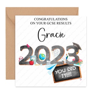 May include: A white card with a black and white chalkboard style illustration of the year 2023 with school supplies. The text "Congratulations on your GCSE results Gracie You Did It!!!" is on the card.