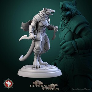 May include: An unpainted miniature figure of a rat-like humanoid, depicted in a dynamic pose with two curved blades. The figure is wearing armour and stands on a circular base. The words "Guts and Gutters" are visible in the image.