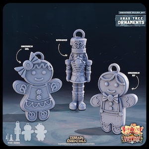 May include: Three Christmas tree ornaments: a gingerbread girl, a gingerbread boy, and a nutcracker. The ornaments are made of grey plastic and have a detailed design. The ornaments are part of a Christmas village set.