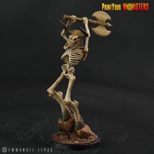 May include: A skeletal figure with a horned skull and ribcage, holding a large axe overhead. The figure stands on a rocky base. The text "PrintYourMonsters" is visible in the upper right corner. The figure is a beige color.