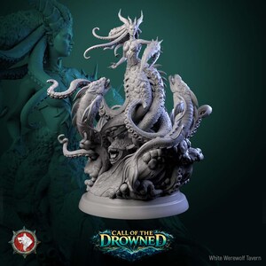 May include: A detailed grey sculpture of a mermaid-like figure with tentacles, fish, and sea creatures. The sculpture has a base and is set against a dark green background. The text "CALL OF THE DROWNED" is visible.