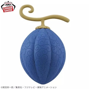 May include: A blue and gold plastic figurine of a fruit with a swirl pattern. The fruit is on a stem with a curved handle.