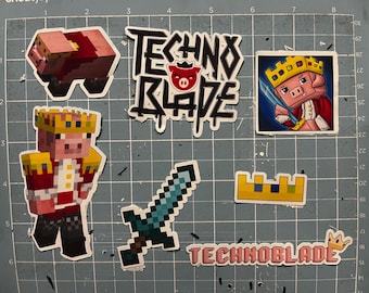 May include: A collection of stickers featuring a Minecraft character, Technoblade, in various poses. The stickers include a pig wearing a crown, a sword, a crown, and the text "Technoblade" and "Techno Blade".
