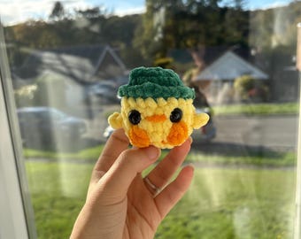Crochet duck in frog hat plushie