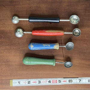 Lot of 4 Vintage Melon Scoop, measuring spoons wooden handles