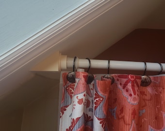 Sloped ceiling curtain rod mount