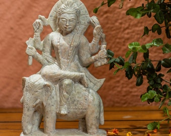 Hindu god of craftsmen, artisans and architecture Vishwakarma on white elephant statue - Son of Lord Brahma stone carved Indian sculpture