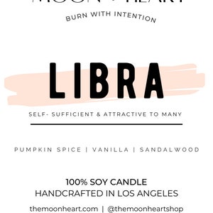May include: A candle with a peach-colored background and the text "LIBRA" in black. The candle is a 100% soy candle, handcrafted in Los Angeles. The scent is pumpkin spice, vanilla, and sandalwood. The candle is 8 ounces or 225 grams.