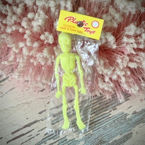 Vintage skeleton ornament Plastic Toys Hong Kong retro yellow skeleton in package