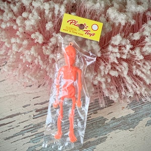 Vintage skeleton ornament Plastic Toys Hong Kong retro orange skeleton in package