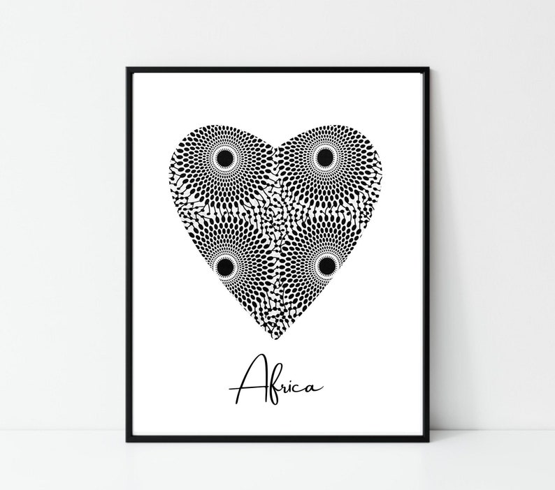 May include: Black and white print of a heart with a geometric pattern. The word "Africa" is written below the heart.