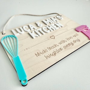 Side view of wooden kids play kitchen sign