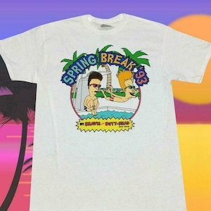 May include: White t-shirt with a graphic of Beavis and Butt-Head in a pool with the text "Spring Break '93".