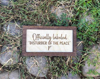 Officially Labeled “Disturber of the Peace” F Wood Engraved Sign | Personalized Fantasy Ring Decor Baby Nursery | Baby Shower Gift