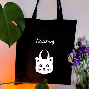 Taurus star sign Astrology tote bag, Adorable Cat as Bull with horns Taurus zodiac black tote bag, Horoscope tote bag uk