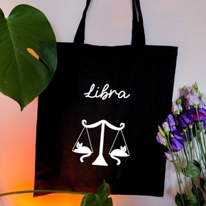 Libra star sign Astrology tote bag, Adorable and humorous two cats in The Scales, Libra zodiac black tote bag, Horoscope tote bag uk