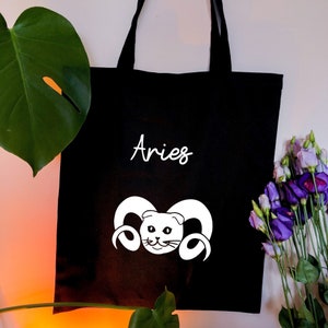 Aries star sign Astrology tote bag, Adorable and humorous Cat with Ram horns Aries zodiac black tote bag, Horoscope tote bag uk