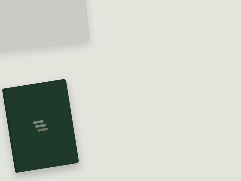 May include: A dark forest green rectangular notebook featuring a minimalist logo consisting of three horizontal, light gray, rounded bars centered on the front cover. The notebook is positioned in the lower left corner of the frame.