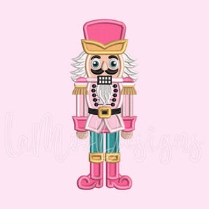 May include: A pink and teal nutcracker with a gold trim and a black mustache. The nutcracker is wearing a pink hat with a gold band.