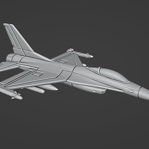 May include: A grey model of a fighter jet with a pointed nose and swept wings. The jet has two missiles attached to the underside of the wings.