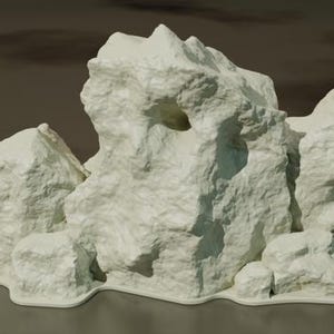 Könnte beinhalten: Eine weiße, felsige, abstrakte Skulptur mit einem Loch in der Mitte des höchsten Felsens.