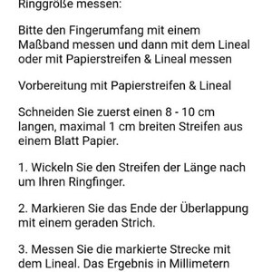 May include: Text on a white background provides instructions on how to measure ring size. The text is in German and includes steps for using a measuring tape or paper strip and ruler. The instructions are for measuring the circumference of a finger.
