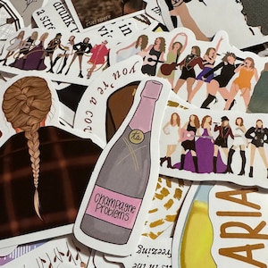 May include: A collection of stickers featuring illustrations of a singer and song lyrics. One sticker shows a champagne bottle with the text "Champagne Problems." Other stickers depict the singer in various outfits and poses. The stickers are in various colors.