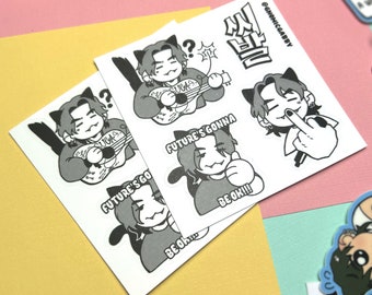 May include: A set of six black and white stickers featuring a cartoon character with cat ears. The stickers include phrases like "Future's Gonna Be Ok!!" and "Future's Go Be Ok!!". The stickers are printed on white paper and have a glossy finish.