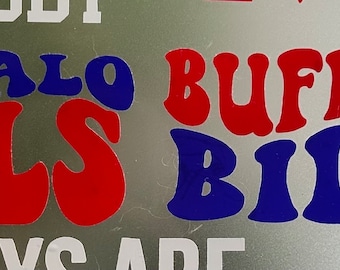 May include: A white background with the words "Buffalo Bills" in red and blue letters. The letters are in a retro font style. The words "Sundays are" are written in white below the team name.