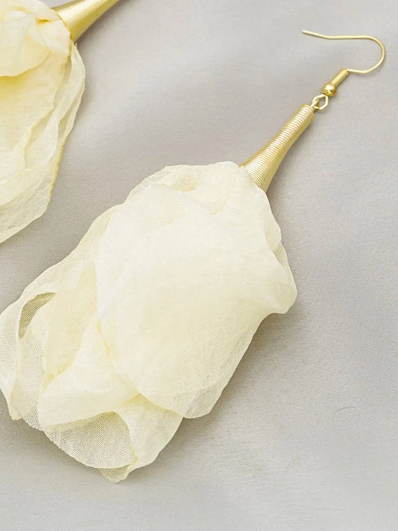 Large white flower best sale earrings