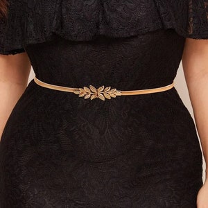 Gold Leaf Buckle Skinny Elastic Belts,  Stretch belts that goes with many outfits.