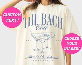 May include: Ivory colored oversized t-shirt with a blue graphic design that says "The Bach Club" with a martini glass illustration and the text "Est. 2023" and "Maria's Bachelorette Charleston, SC". The text "Custom Text!" and "Choose Your Images!" are in pink circles.