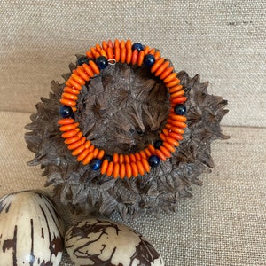 Orange Tagua Nut and Blue Eye of the Tiger Memory Wire Bracelet