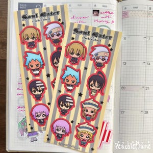 May include: Two vertical sticker sheets featuring chibi-style anime characters from Soul Eater. Each sheet has a beige and grey striped background with black stars and the text Soul Eater sticker sheet printed at the top in a gothic font.