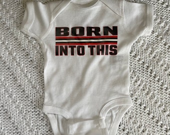 Little Brown Born Into This Cle Ohio Infant Baby Rib Bodysuit For Sporting Events, Parties, Etc.