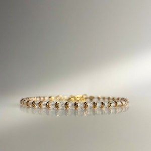 Rock crystal bracelet EMPYREAL with faceted beads, 18k gold plated spacer beads, 14-17 cm long, handmade