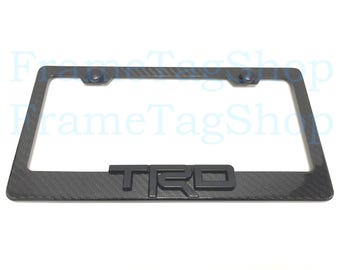 1x Black TRD 3D Emblem Badge Real 3K TwillWeave Real Carbon Fiber License Plate Frame