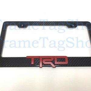 1x Red TRD 3D Emblem Badge Real 3K TwillWeave Real Carbon Fiber License Plate Frame