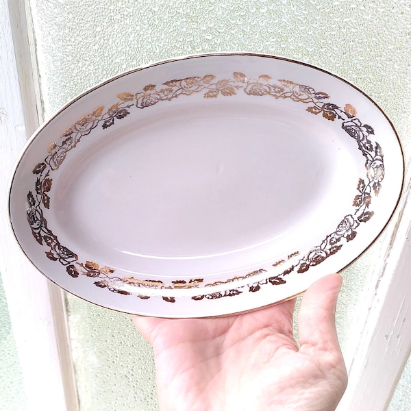 Small Vintage Oval Serving Dish In Off-White Earthenware With Frieze Of Golden Roses, "Bretagne" Model From Moulin Des Loups Orchies France