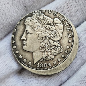 Dollar Morgan 1884 Bokstaven O USA-mynt präglat med ett fel / Omstämning / Nyhet