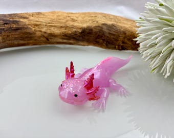 Ajolote de resina epoxi, brilla en la oscuridad, único, hecho a mano, pieza única, morado, rosa, brillante