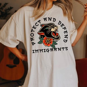 Comfort Colors Protect & Defend Shirt, No Human Is Illegal Shirt, Pro Immigrants Tshirt, Anti ICE Protest Shirt, Civil Rights Activist Shirt