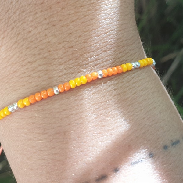 Minimalist orange Boho summer bracelet in seed beads